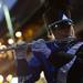 A high school marching band member performs during the Outback Bowl New Year's eve parade in Ybor City, Fla. on Monday night. Melanie Maxwell I AnnArbor.com
